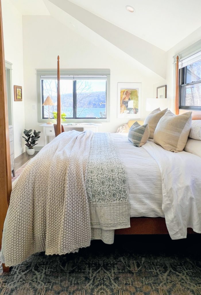 Decorated Room with a King Size Bed Made with Target and Pottery Barn Bedding 